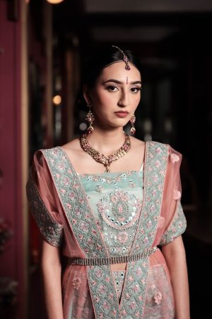 Pastel blue lengha with pink net dupatta