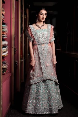 Pastel blue lengha with pink net dupatta