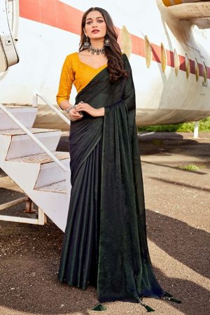 Bottle green silky saree with sequin blouse